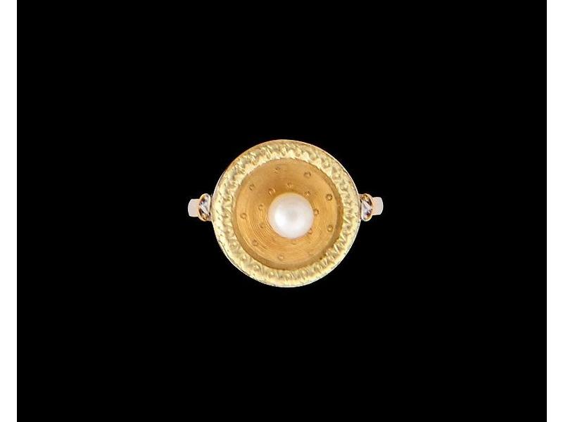 PETITE BAGUE en ors de couleurs (750) à châton...