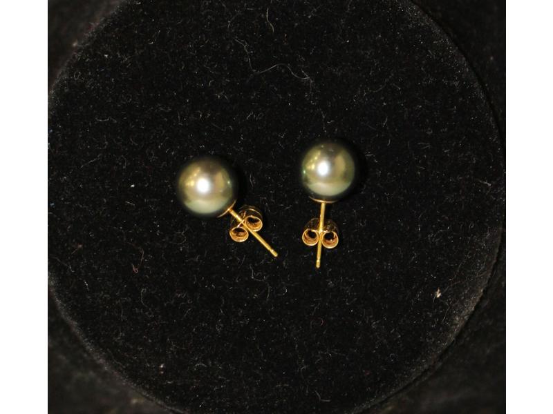 PAIRE DE BOUTONS D'OREILLES en or 18k sertis...