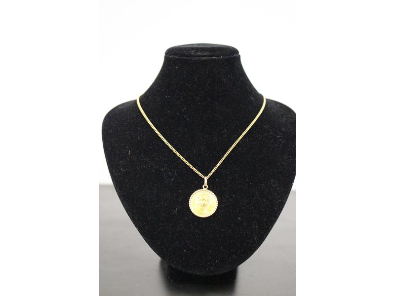 MEDAILLE ET CHAÎNE en or jaune (750).