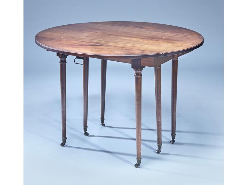 TABLE ronde à volets en acajou et placage...