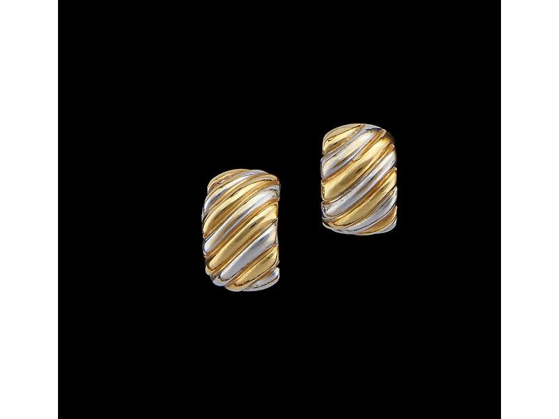 PAIRE DE BOUTONS D'OREILLES de forme bombée...