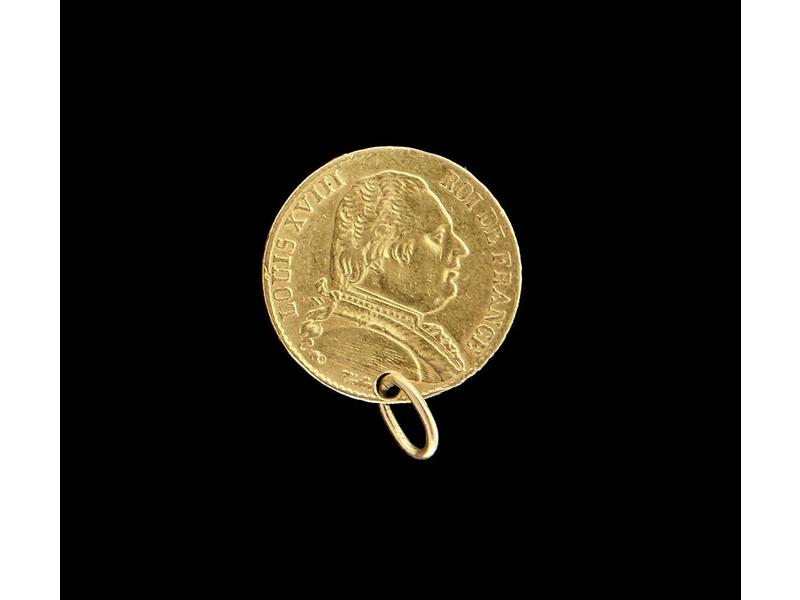 PENDENTIF en or formé d'un 20 fr or Louis...