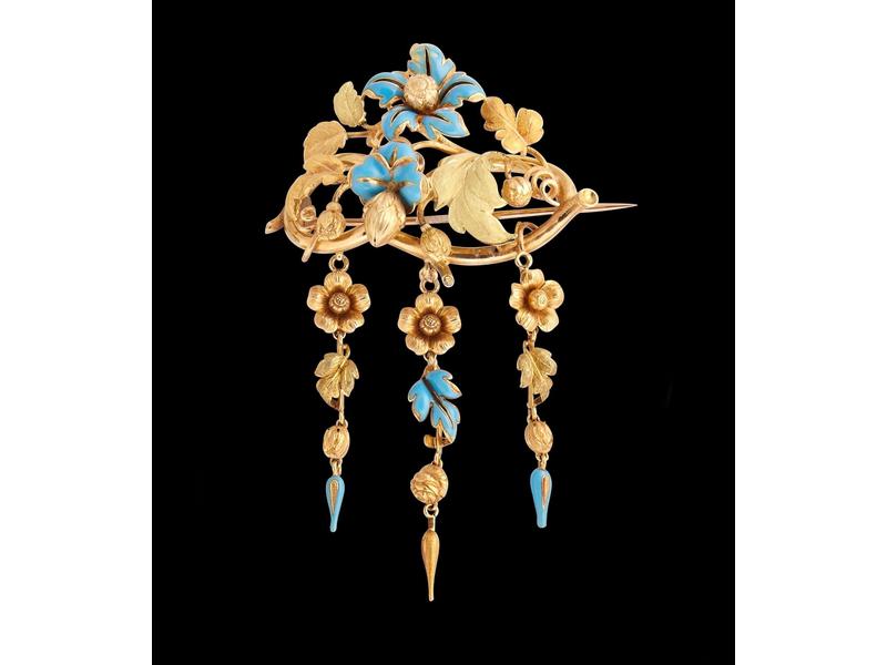BROCHE FLEURS en or jaune deux tons (18K)...