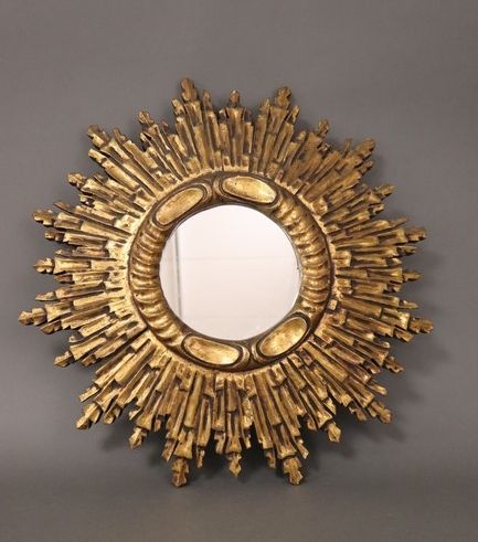 MIROIR SOLEIL de forme circulaire dans un...
