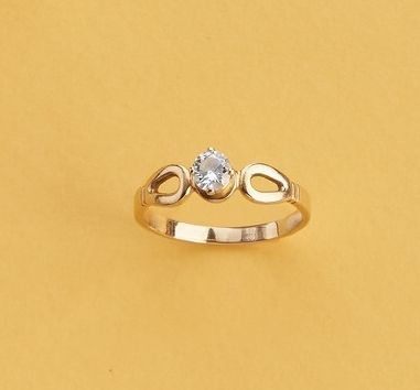 PETITE BAGUE en or (750) ornée d'un diamant...