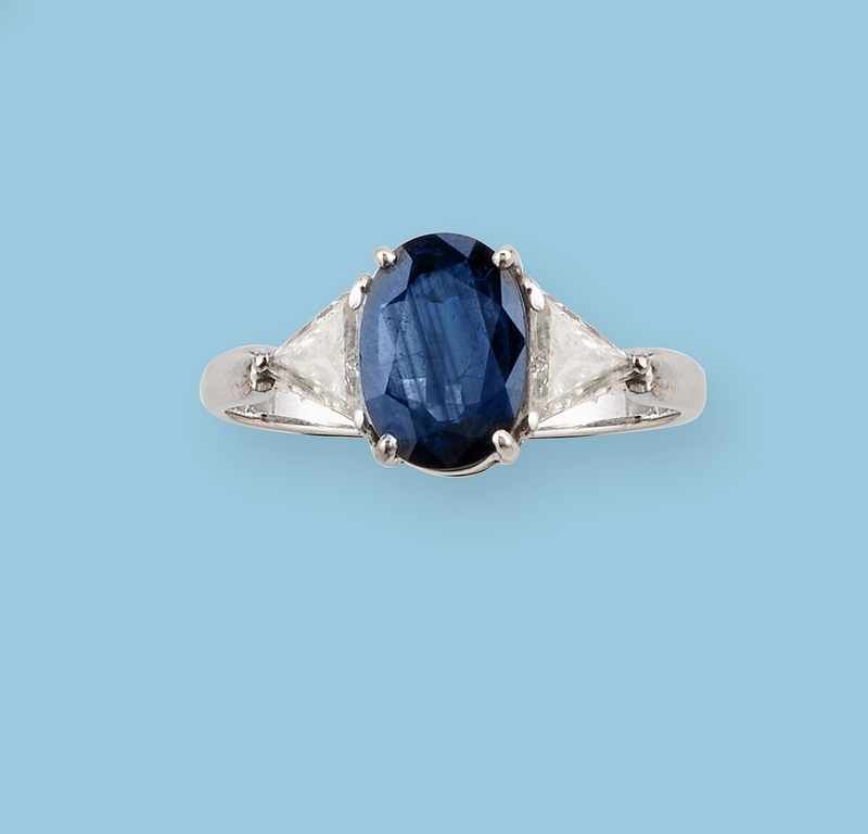 BAGUE en or gris (750mm) centrée d'un saphir...
