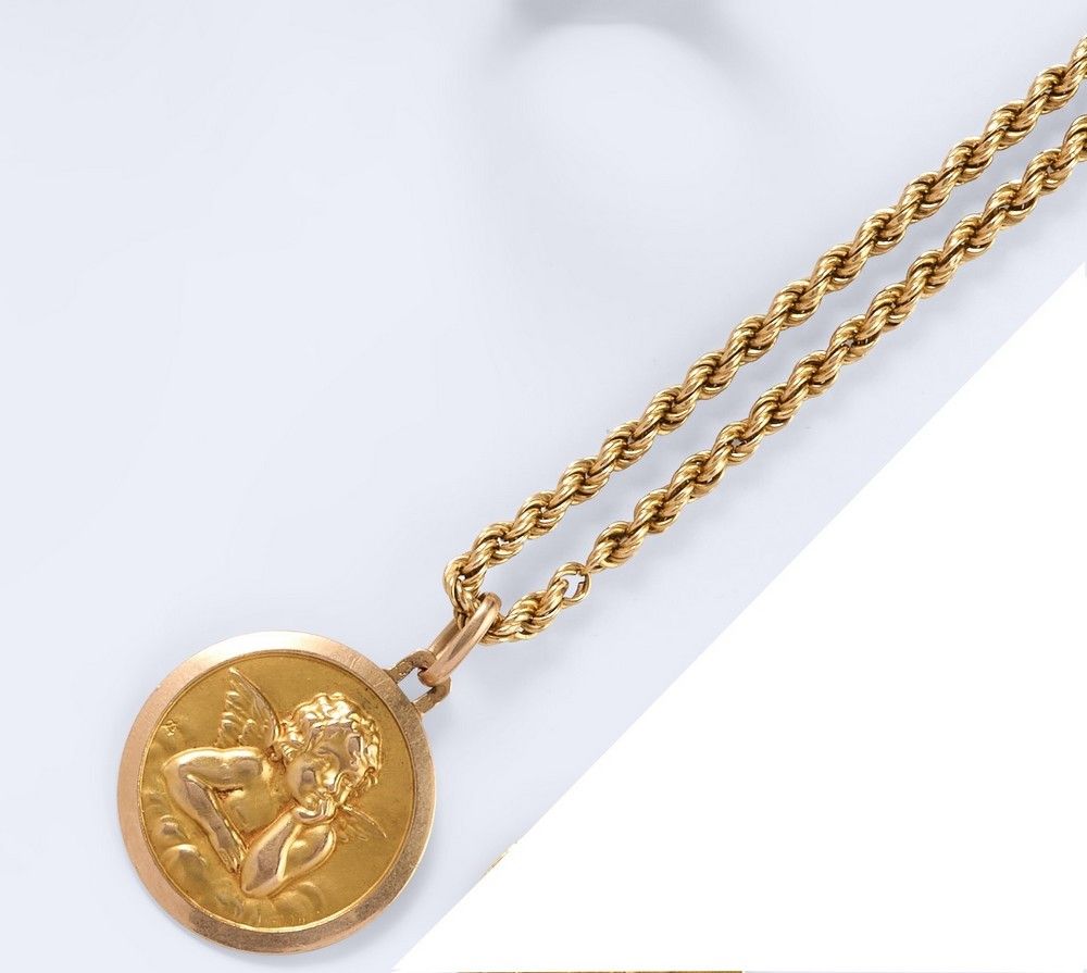 MEDAILLE figurant un ange et CHAINE en or...