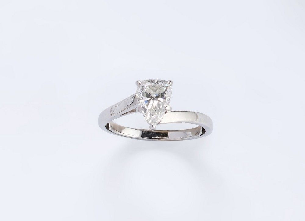 SOLITAIRE en or gris (750) et son diamant...