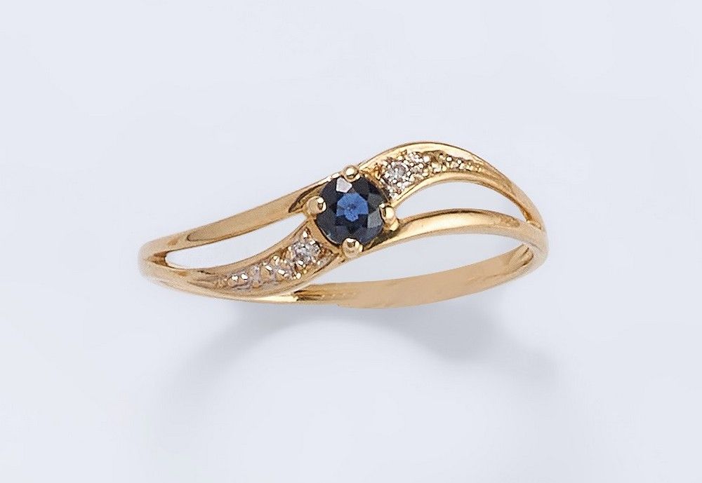 PETITE BAGUE en or jaune (750) avec petit...
