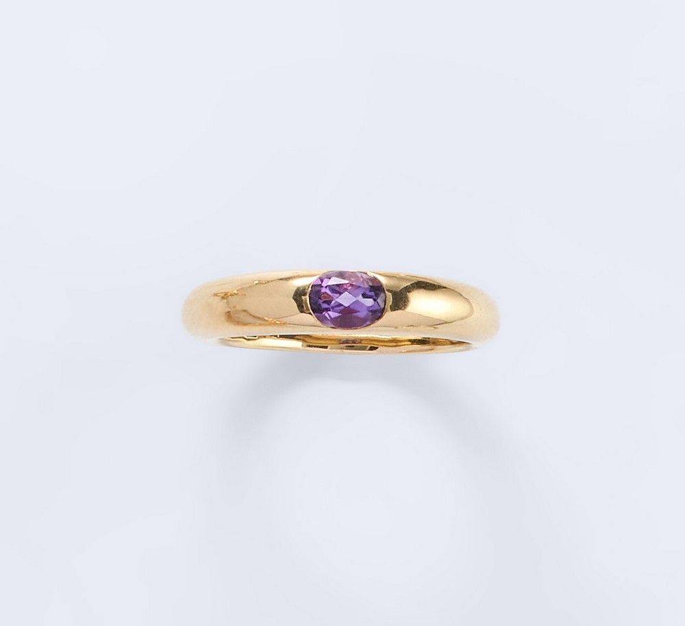 BAGUE jonc en or jaune (750) avec améthyste...