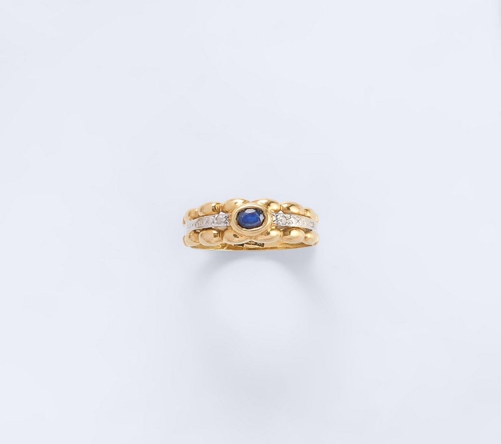 BAGUE jonc en or jaune et gris (750) avec...