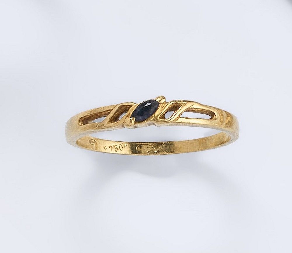 PETITE BAGUE en or jaune (750) ornée d'une...