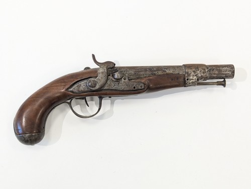 Pistolet à percussion.