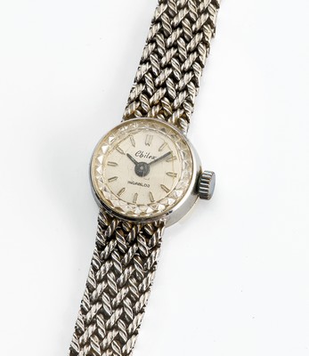 PETITE MONTRE bracelet de dame, en or gris...