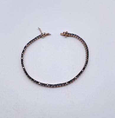 BRACELET en argent (925) orné de petites...
