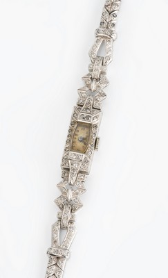 MONTRE bracelet de dame, en platine et or...