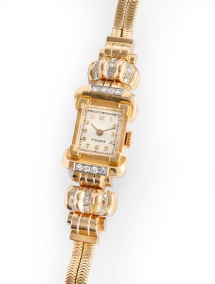 MONTRE bracelet de dame en or (750) et platine,...