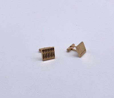 PAIRE DE BOUTONS DE MANCHETTES en or (750)....