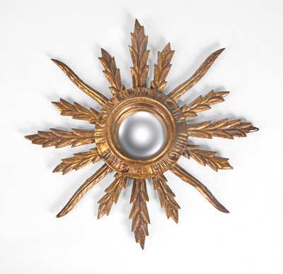 MIROIR SORCIERE à cadre en bois doré sculpté...