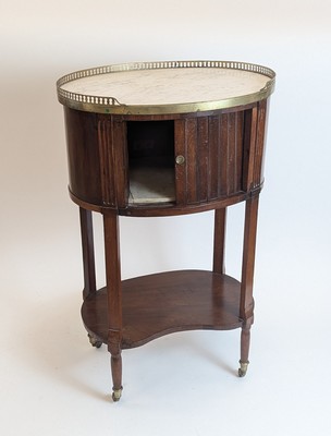 TABLE TAMBOUR de forme ovale en acajou et...