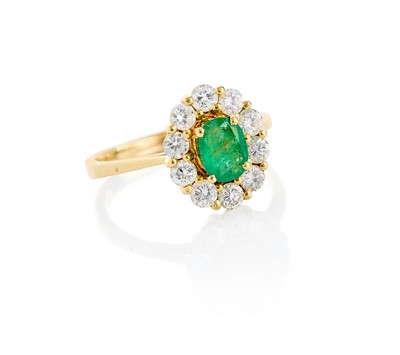 BAGUE MARGUERITE en or (750) centrée d'une...