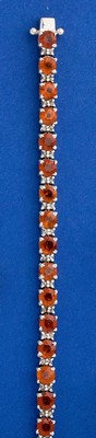BRACELET ligne en argent (925) ornée de grenats...