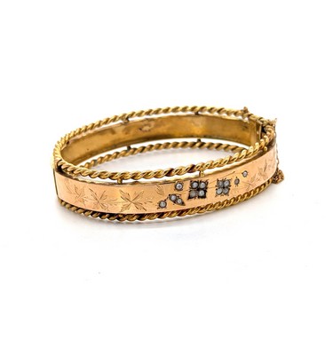 BRACELET MANCHETTE rigide en or (750) à bordures...