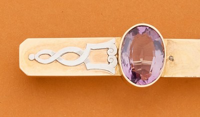 BROCHE moderniste en or (750) sertie d'une...