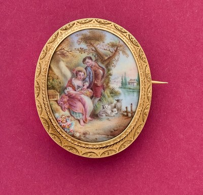 BROCHE en or (750) sertie d'une peinture...