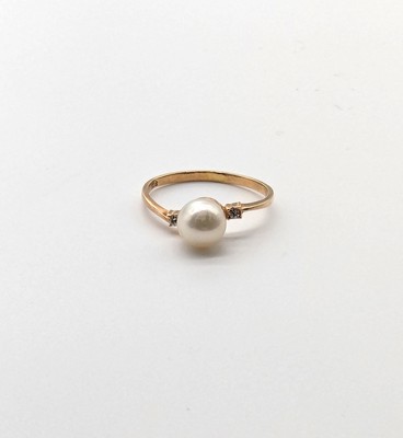 BAGUE en or (750) avec perle de culture et...