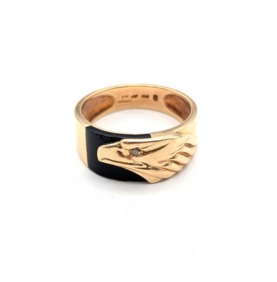 BAGUE D'HOMME en or (585) à décor d'une tête...
