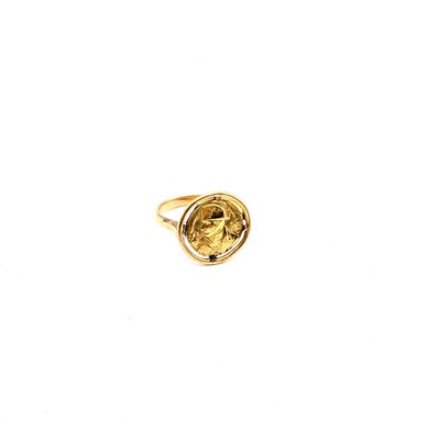 BAGUE en or (750) sertissant une médaille...