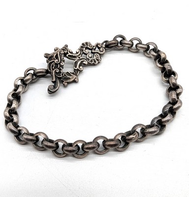 BRACELET en argent (925), fermoir ciselé...
